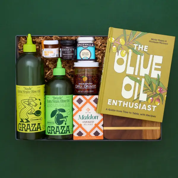 gift box with kitchen and food products on a dark green background