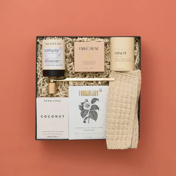 spa gift box on a peach background